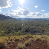 Standing on an ancient lava flow in Tsavo West National Park, Kenya